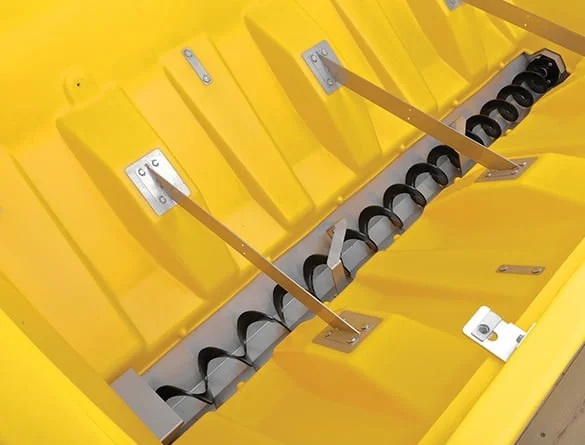 Wessex Snowex Helixx Spreaders | Middlewich Machinery Close-up of the interior of a wessex snowex helixx spreader with metal parts and black spirals.